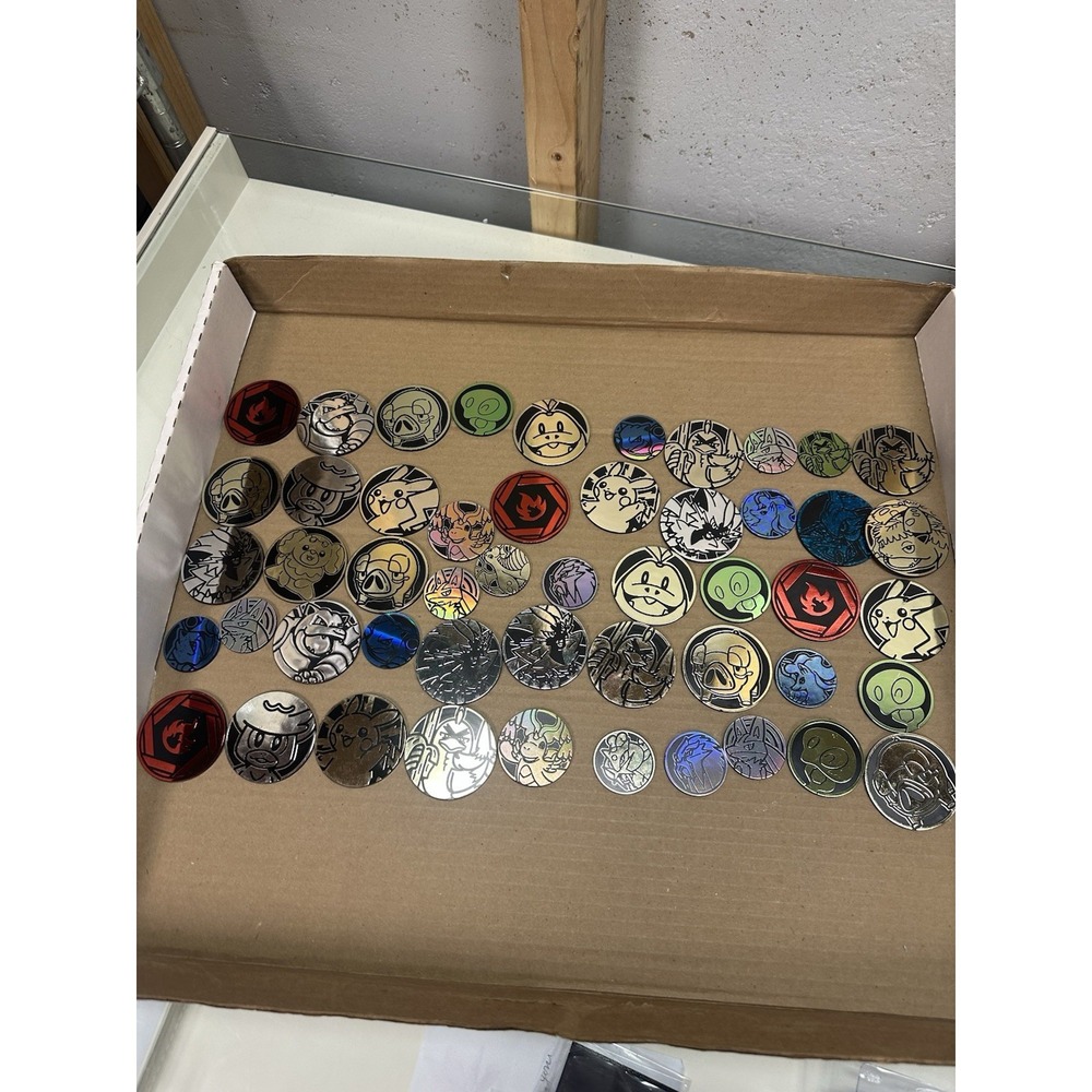 Pokémon TCG - 50 Official Coin Lot  Mixed Years & Styles, Varying Condition!